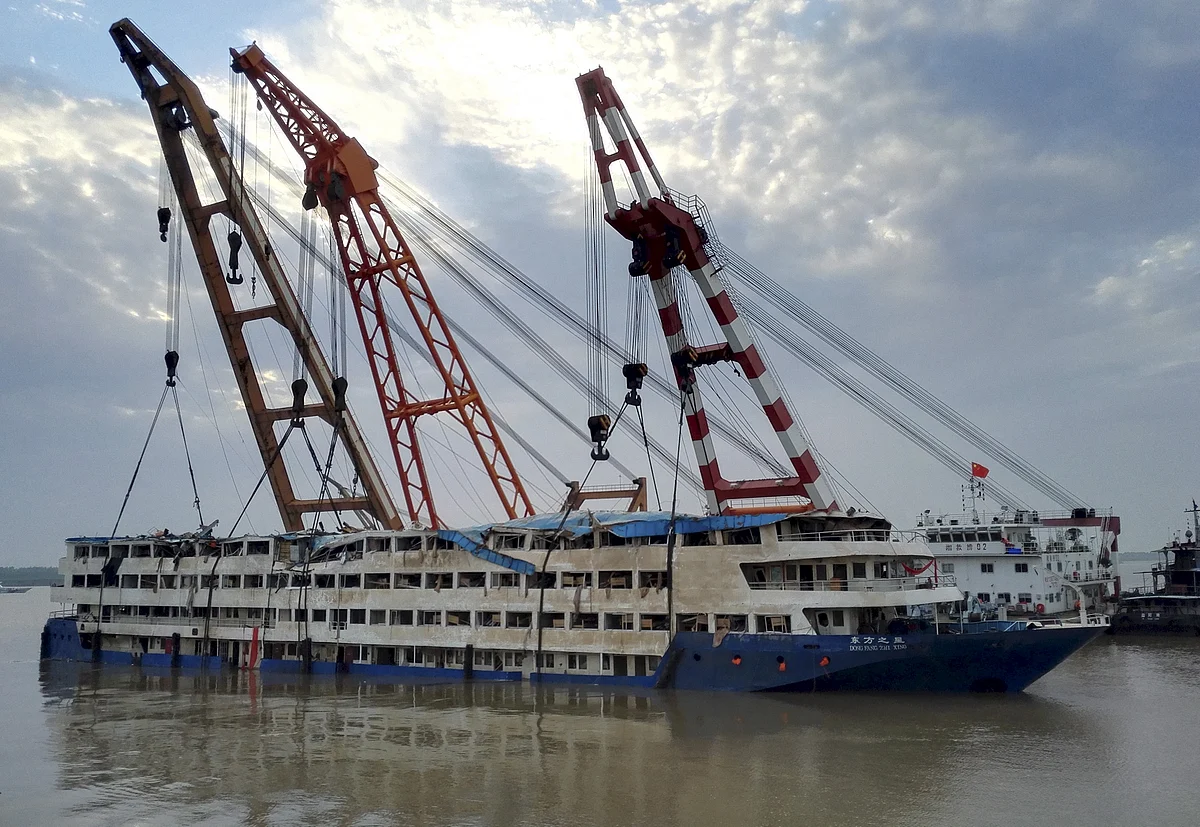 The Eastern Star, a cruise ship which sank with 456 people on board stands righted by rescue workers. (Photo: Reuters)