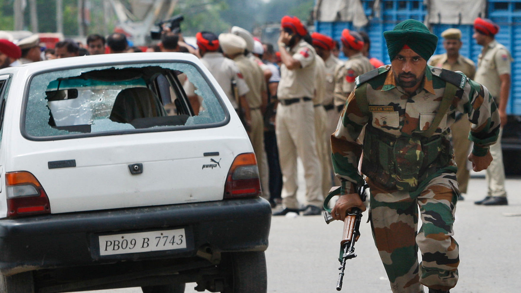 Security personnel at Dinanagar area where the terror attack took place. (Photo: AP)