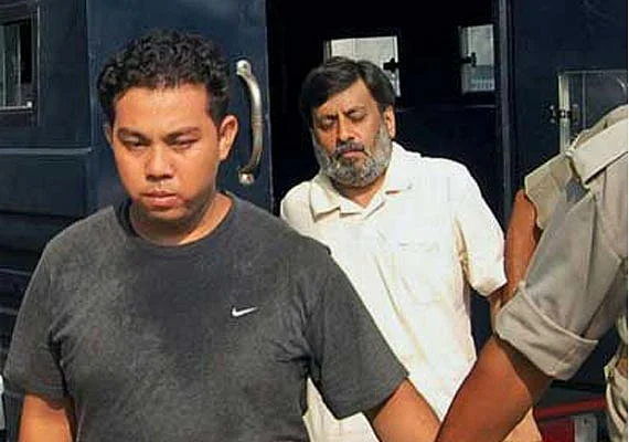 Rajesh Talwar and Krishna, who worked as a compounder for the Talwars, in police custody. 