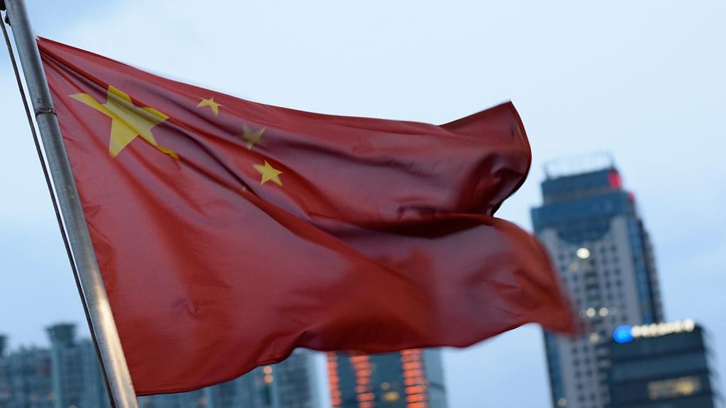 Chinese flag on a boat in Shanghai. (Photo: The Quint)