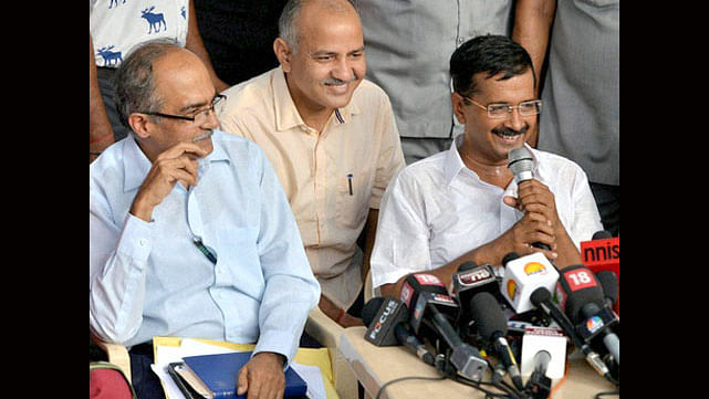 From left, fromer AAP leader&nbsp;Prashant Bhushan with Delhi Deputy CM Manish Sisodia and Chief Minister Arvind Kejriwal at a press conference. (File Photo: PTI)