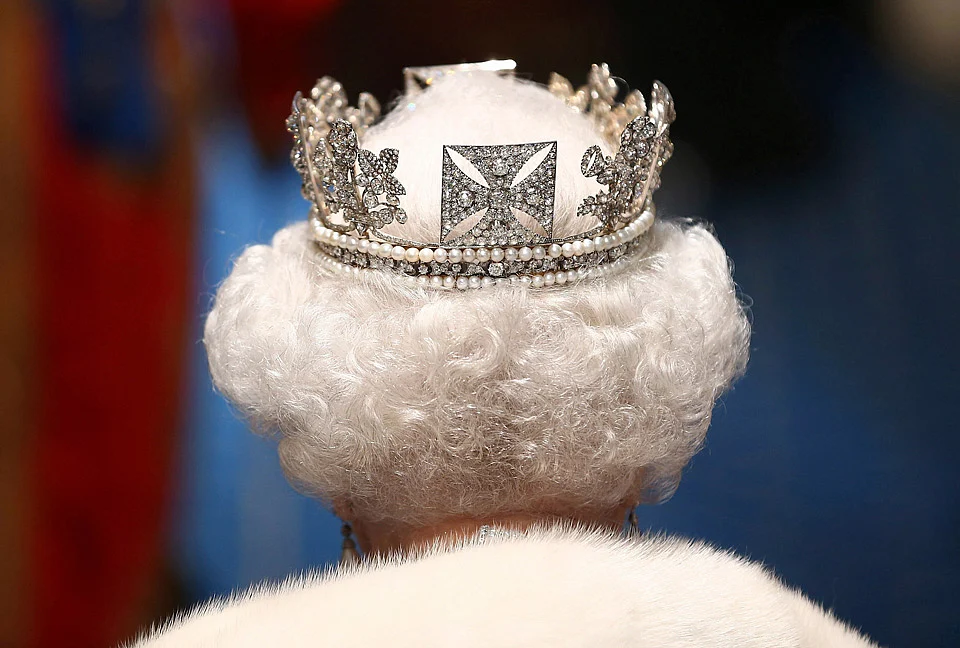 Britain’s Queen Elizabeth arrives for the State Opening of Parliament, at the Palace of Westminster in London. (Photo: Reuters)