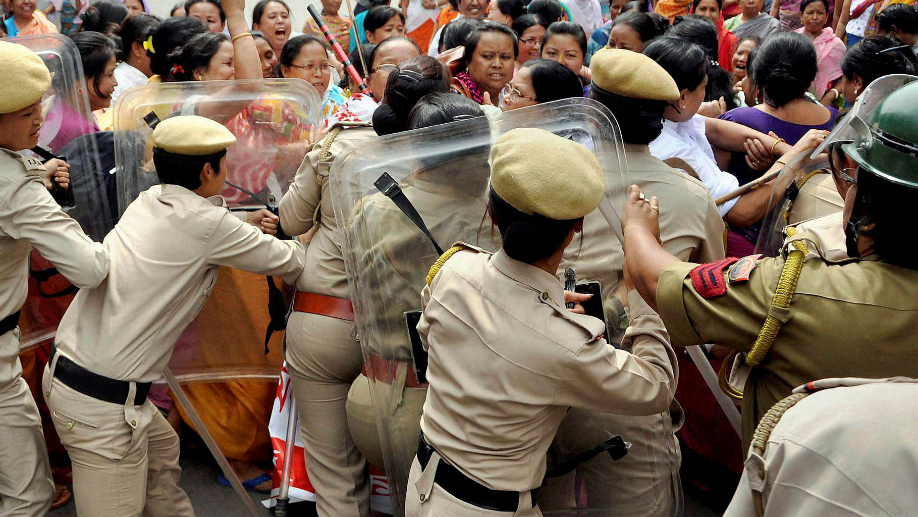 Police personnel try to stop demonstrators during a protest rally&nbsp;in Manipur. (Photo: PTI)