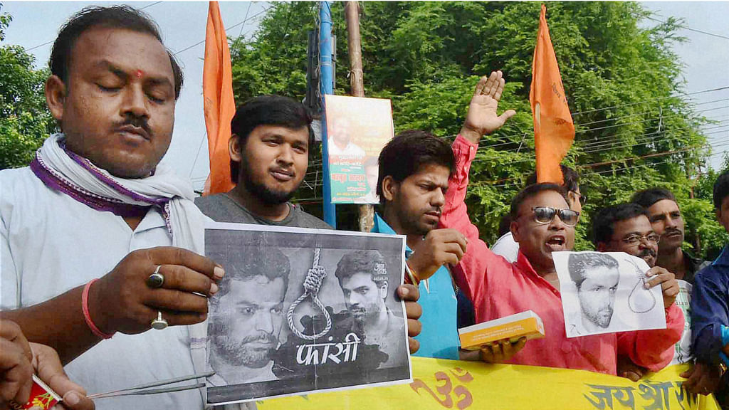 The judges in Yakub Memon’s case held that the death warrant issued by the TADA court on April 30 suffered from no legal infirmity. Vishwa Hindu Parishad workers celebrate Yakub Memon’s hanging in Allahabad, July 30, 2015. (Photo: PTI)