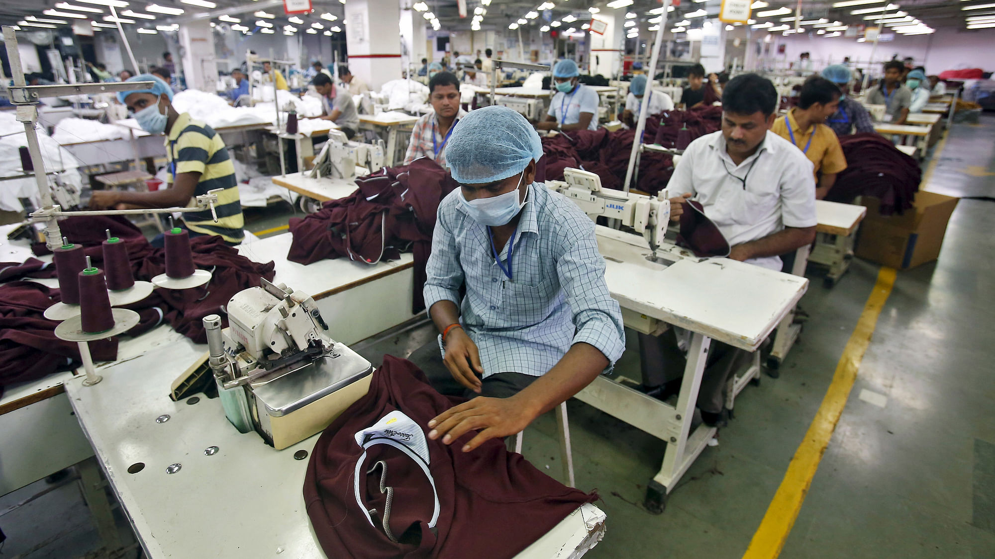 Employees work inside a garment factory of Orient Craft Ltd in Gurgaon in Haryana.&nbsp;
