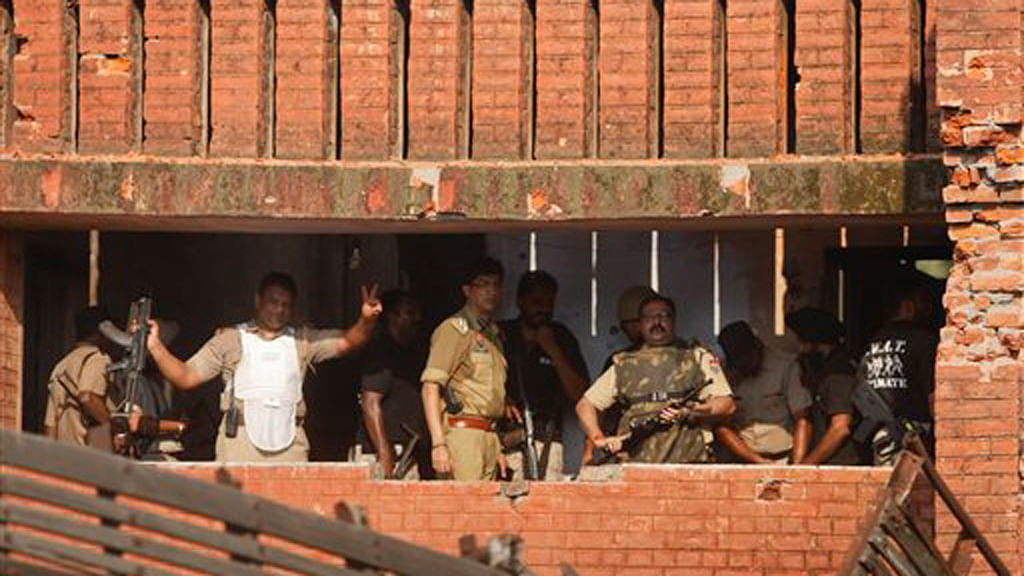 Time for some introspection perhaps? A police officer flashing a victory sign after the end of a gun battle with terrorists, Dinanagar, Punjab, July 27, 2015.  (Photo courtesy: AP)