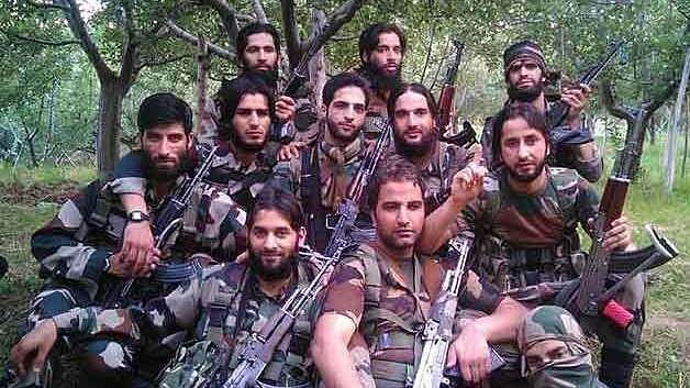 A group photo of Hizbul and Lashkar militants with Burhan Wani  at the centre. (Photo Courtesy: IBN Live)