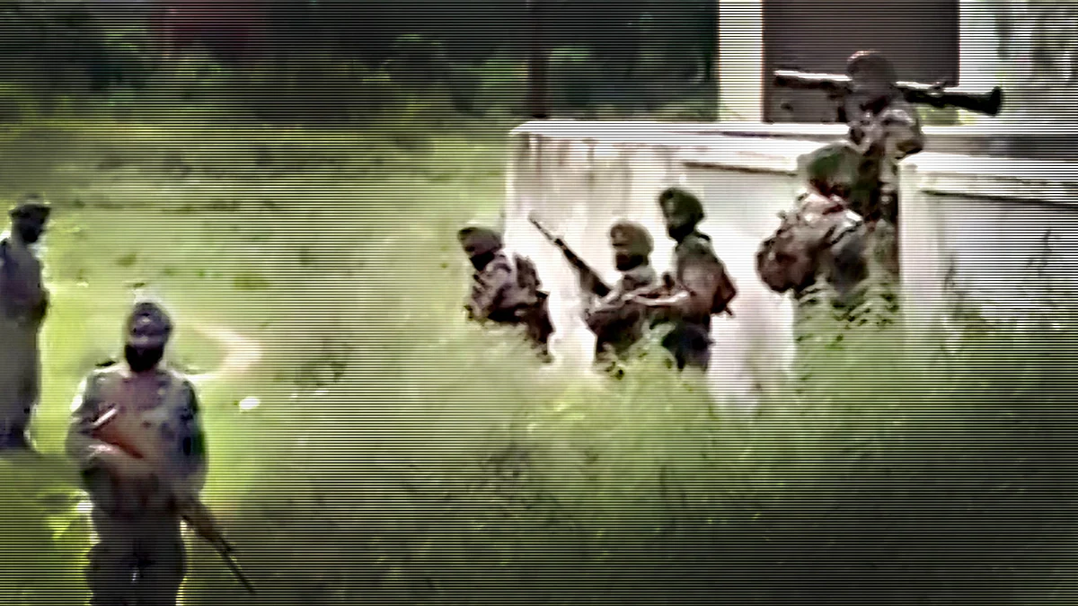 Security personnel in the Dinanagar attack area. (Courtesy: ANI)