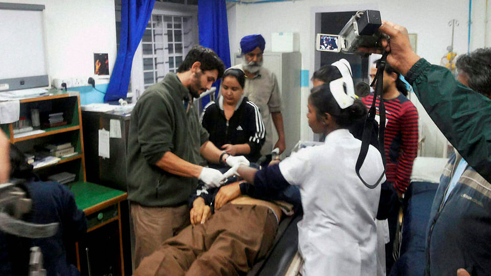 An injured ITBP jawan is treated after he was shot at by a colleague at the Lal Bahadur Shastri National Academy of Administration in Mussoorie. (Photo: PTI)