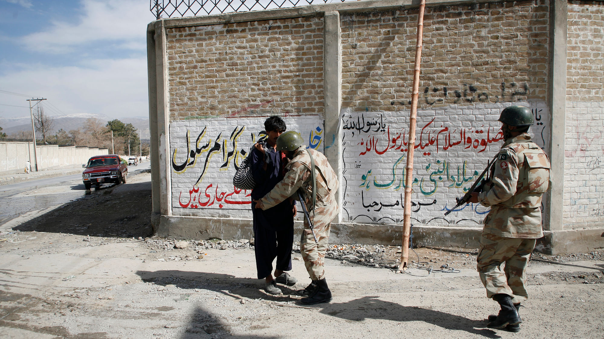 File image of Pakistani Paramilitary soldiers searching a man from the Hazara community  in Quetta after Lashkar-e-Jhangvi’s  sectarian attack on Shias which killed 80 people in&nbsp;Quetta on February 16, 2013. (Photo: Reuters)