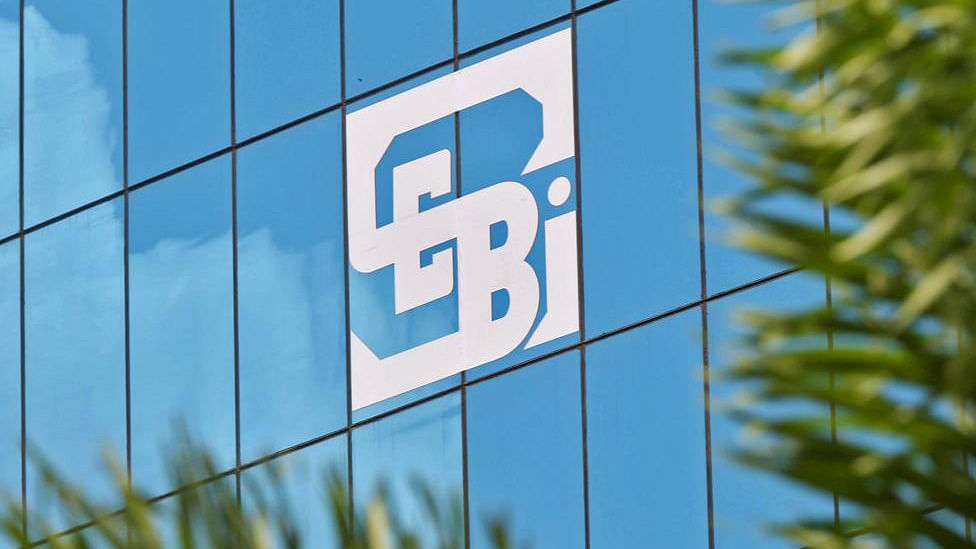 The logo of the Securities and Exchange Board of India (SEBI), India’s market regulator, is seen on the facade of its head office building in Mumbai.