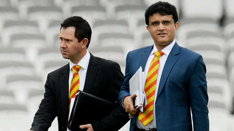 Ricky Ponting and Sourav Ganguly from the World cricket committee walk on the pitch at the Melbourne Cricket Ground. (Photo: Reuters)