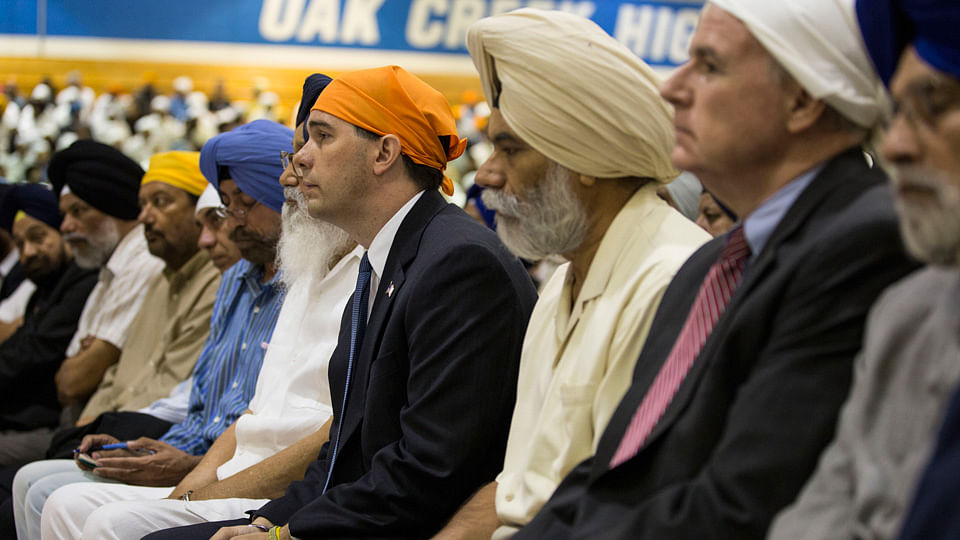 Representational Image: Wisconsin Governor Scott Walker (C) attends the wake and visitation service for victims of last Sunday’s attack at a Sikh temple, at Oak Creek High School, in Oak Creek, Wisconsin in 2012. (Photo: Reuters)