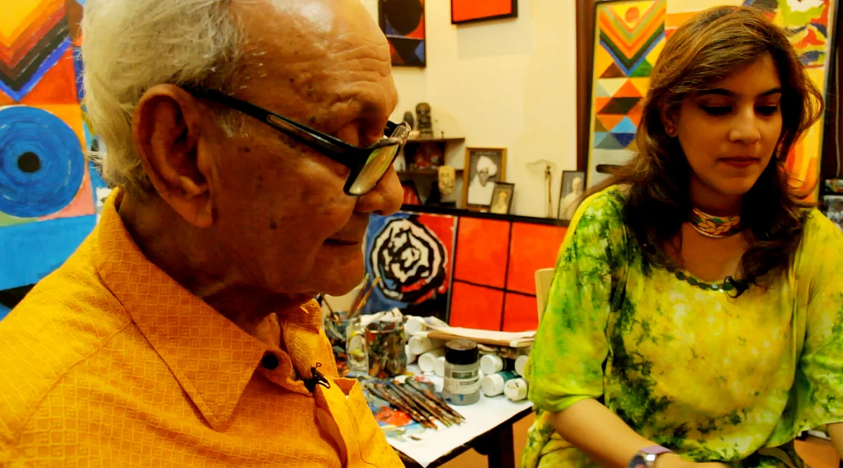 The writer with Raza in his studio. (Photo courtesy: Sahar Zaman)