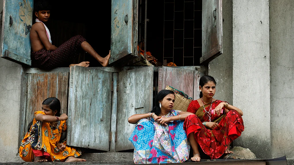 Sex workers photographed in one the country’s oldest red light areas in Mumbai ‘Kamathipura’. (Photo: Reuters)