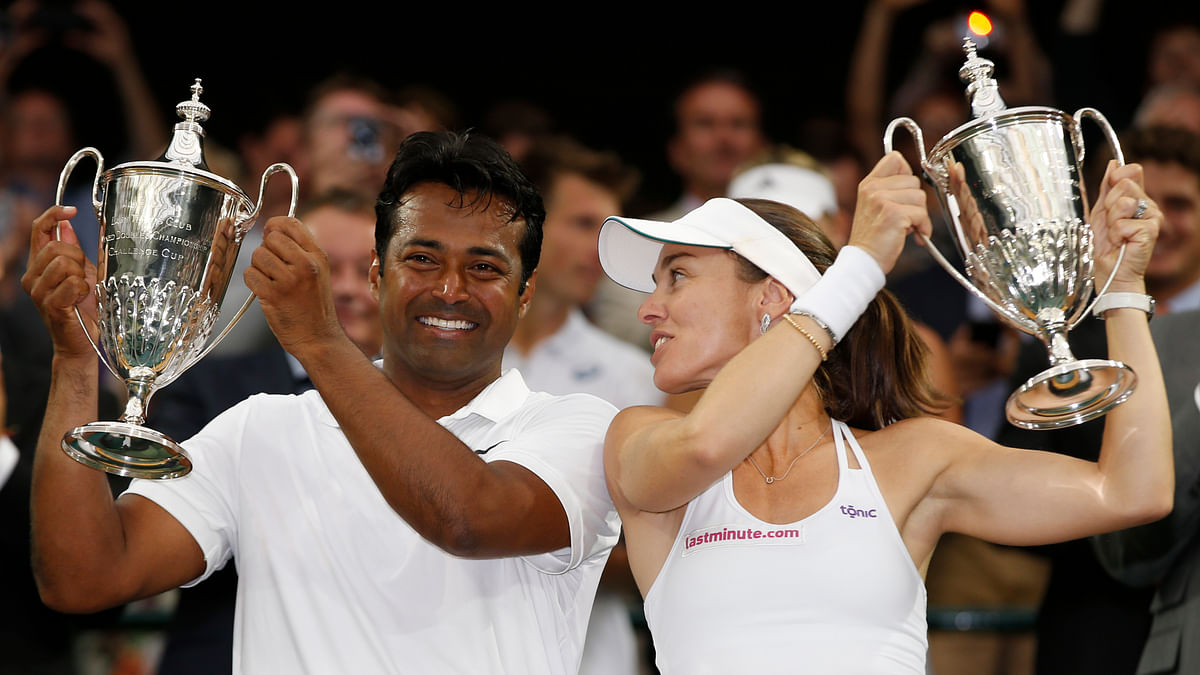 Leander Paes is defending his mixed doubles title with Martina Hingis.