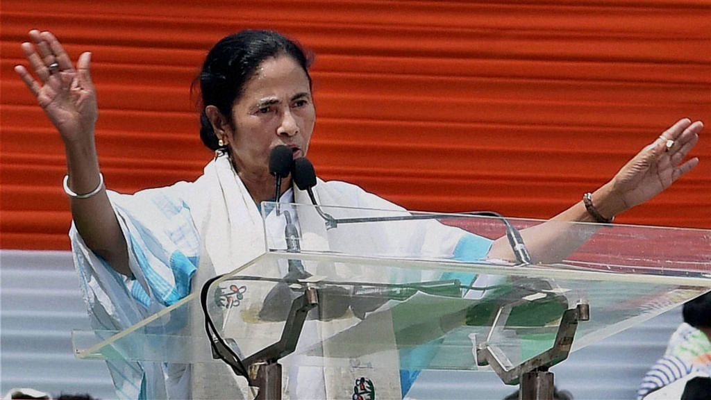 Mamata Banerjee addressing the crowd gathered on the occasion of Martyr’s Day in Kolkata. (Photo: PTI)