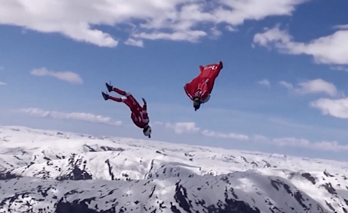 These skydivers dangerously switch between wingsuiters at a high of 7,000 ft. (Photo: AP sceengrab)