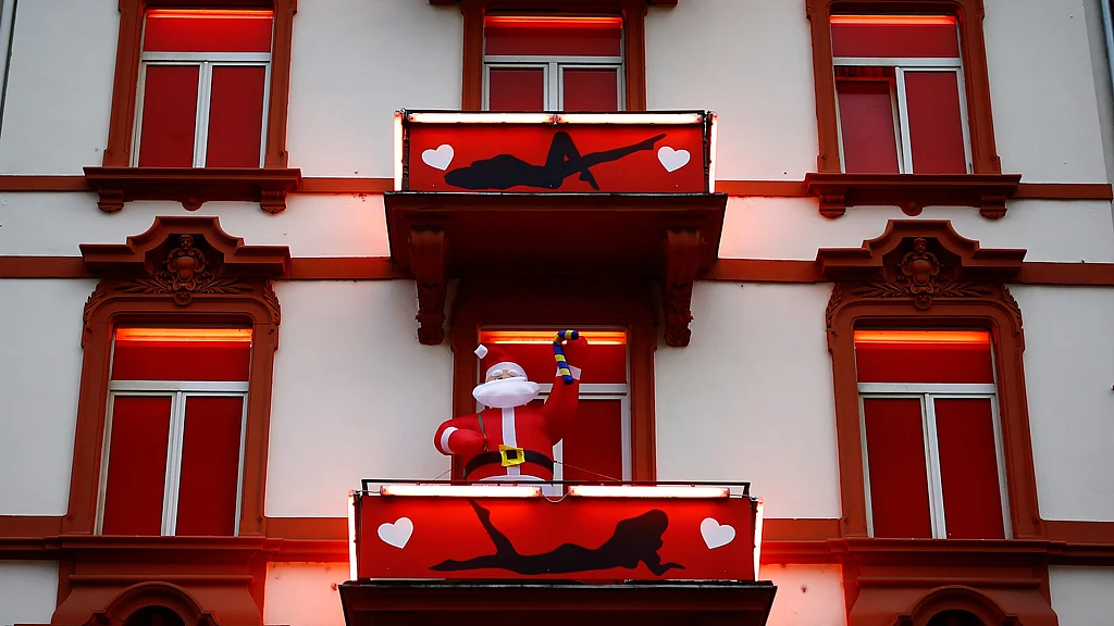 A huge inflatable Father Christmas figure is seen in the balcony of a brothel in the red-light district of Frankfurt. (Photo: Reuters)