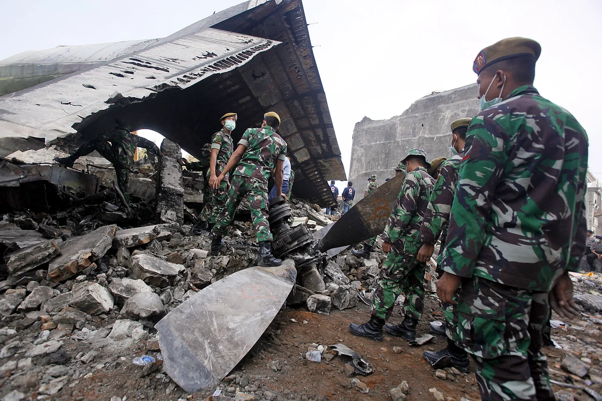 The Hercules C-130 plane crashed into a residential neighborhood in the country’s third-largest city on June 30. (Photo: AP)