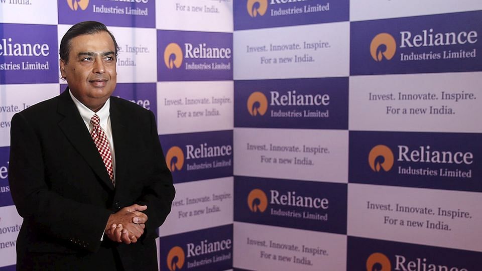 Mukesh Ambani, chairman of Reliance Industries Limited, poses for photographers before addressing the annual shareholders meeting in Mumbai, India, June 12, 2015.&nbsp;