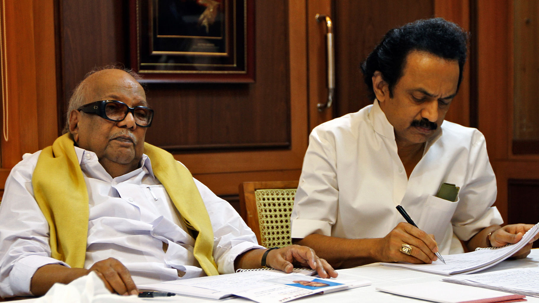  M Karunanidhi (left) former Tamil Nadu Chief Minister and leader of Dravida Munnetra Kazhagam (DMK) party attends a meeting besides his son MK Stalin, a DMK leader.&nbsp;