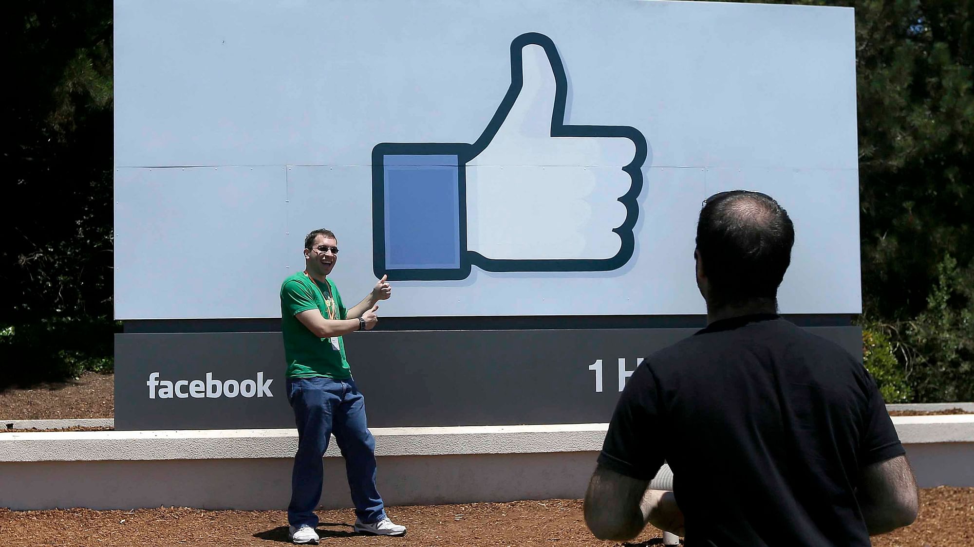 Aman poses for photographs in front of the Facebook sign on the Facebook campus in Menlo Park, California.&nbsp;(Photo:AP Photo)
