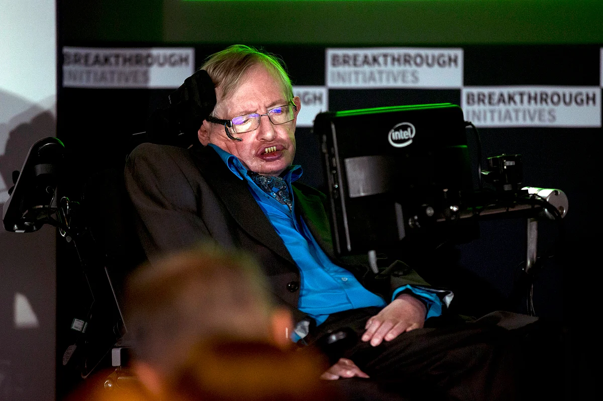 Renowned physicist Stephen Hawking sits in front of a presentation image during a press conference in London. (Photo: AP)