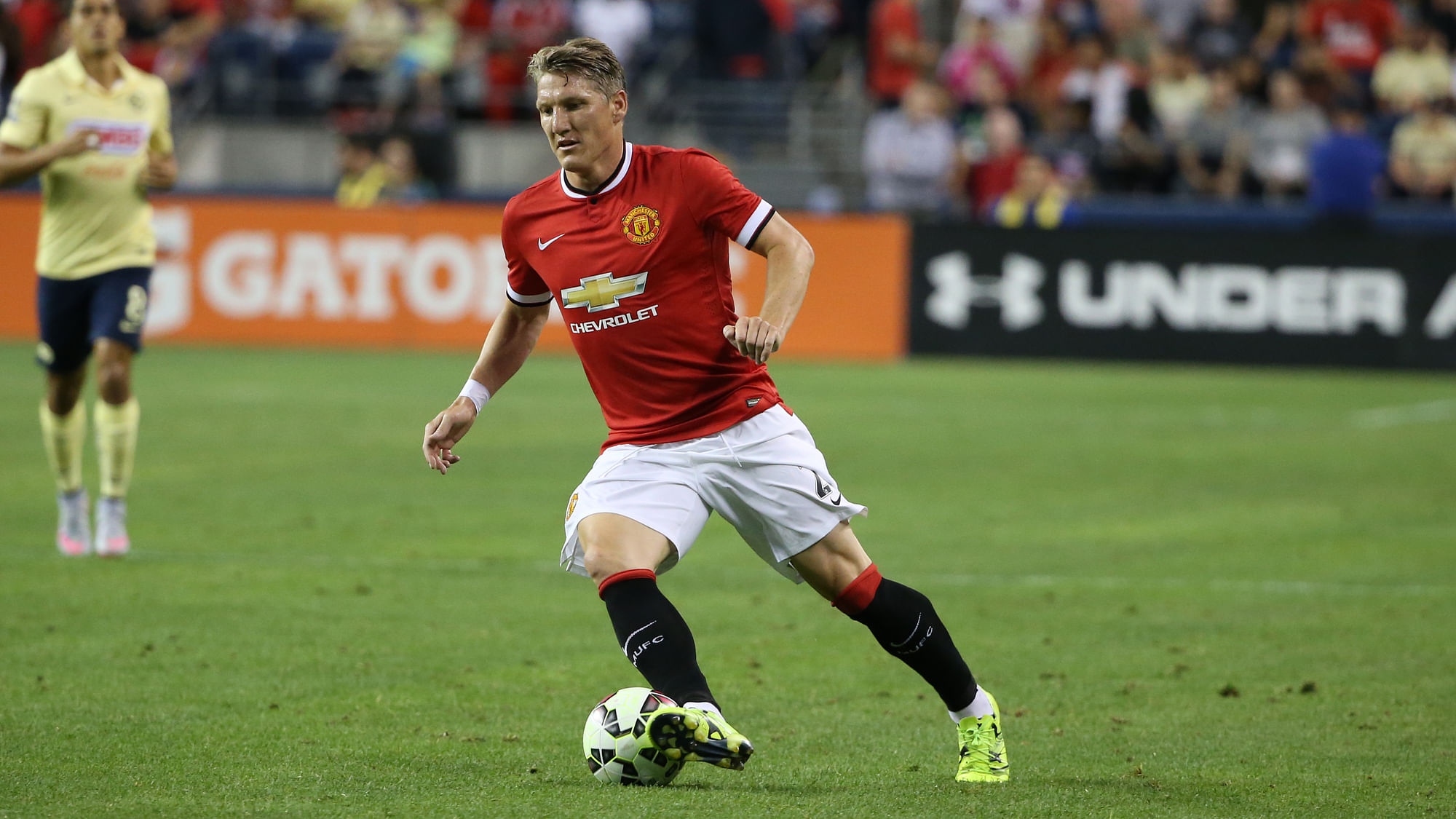 Bastian Schweinsteiger playing for Manchester United in an exhibition match. (Photo: AP)
