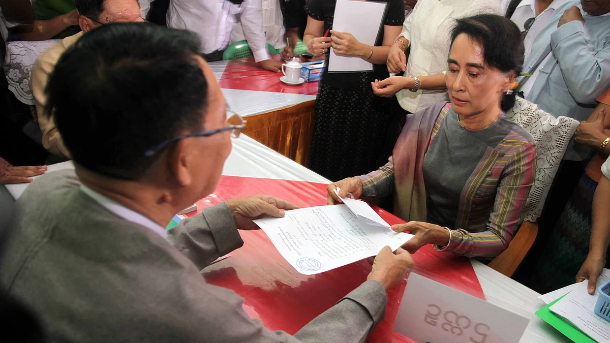 File photo of Aung San Suu Kyi registering for November elections to keep her seat in parliament and challenge the ruling military-backed party. (Photo: AP)
