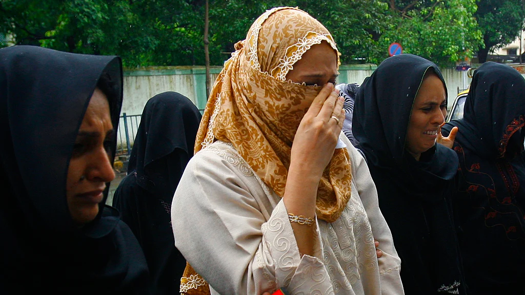 In 2007 Yakub Memon’s wife Raheen (Centre) gave her only interview to the media after he was sentenced to death. She said “we returned because we were living under house arrest in Karachi. We didn’t like it there”. (Photo: Reuters)
