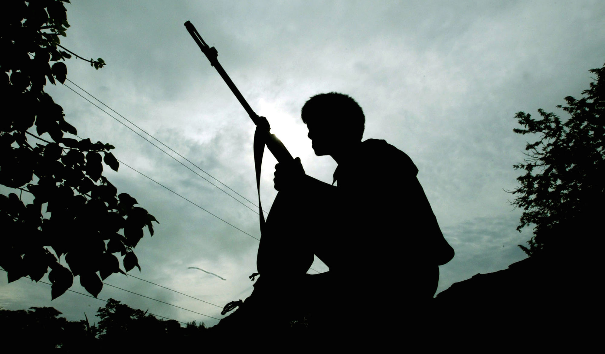 A Naga rebel stands guard (Photo: Reuters)