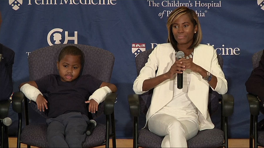Zion Harvey with his mother Pattie Ray at a press conference. (Courtesy: AP Screengrab)