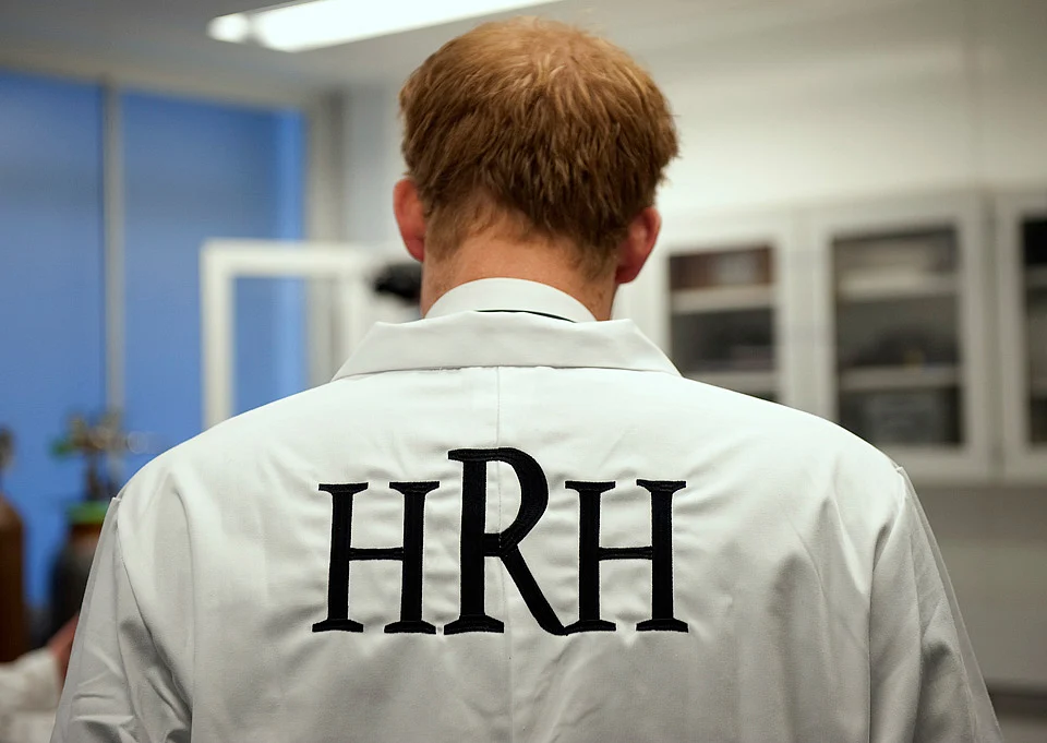Britain’s Prince Harry wears a lab coat personalised with HRH as he opens the Royal British Legion Centre for Blast Injury Studies at Imperial College London. (Photo: Reuters)