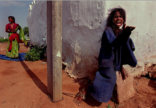 2013 Barabanki: A mentally challenged woman chained to a cement post outside a<i> dargah </i>(Photo: PTI)
