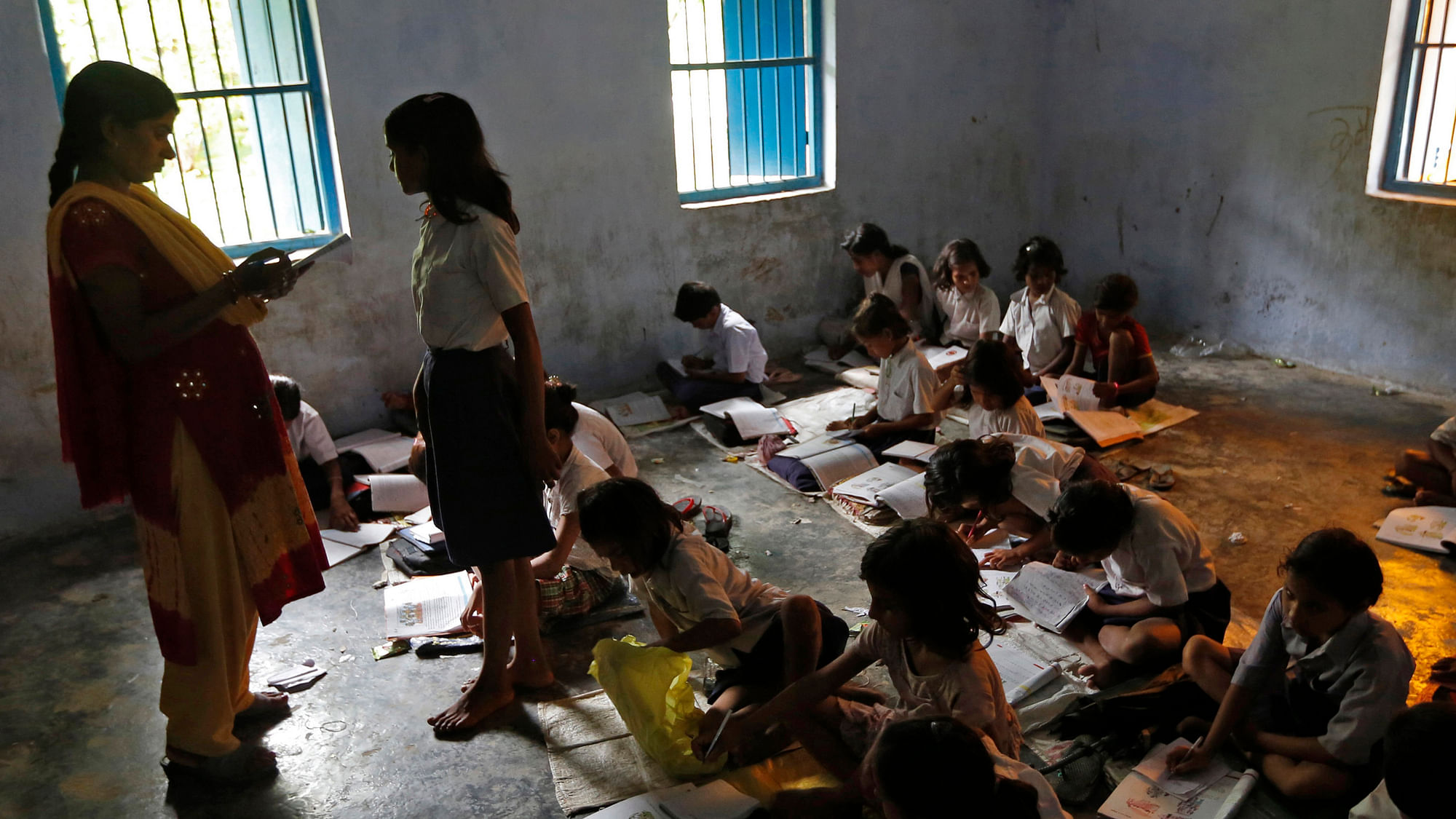 Schoolchildren study inside a classroom in Chapra district of Bihar.&nbsp;