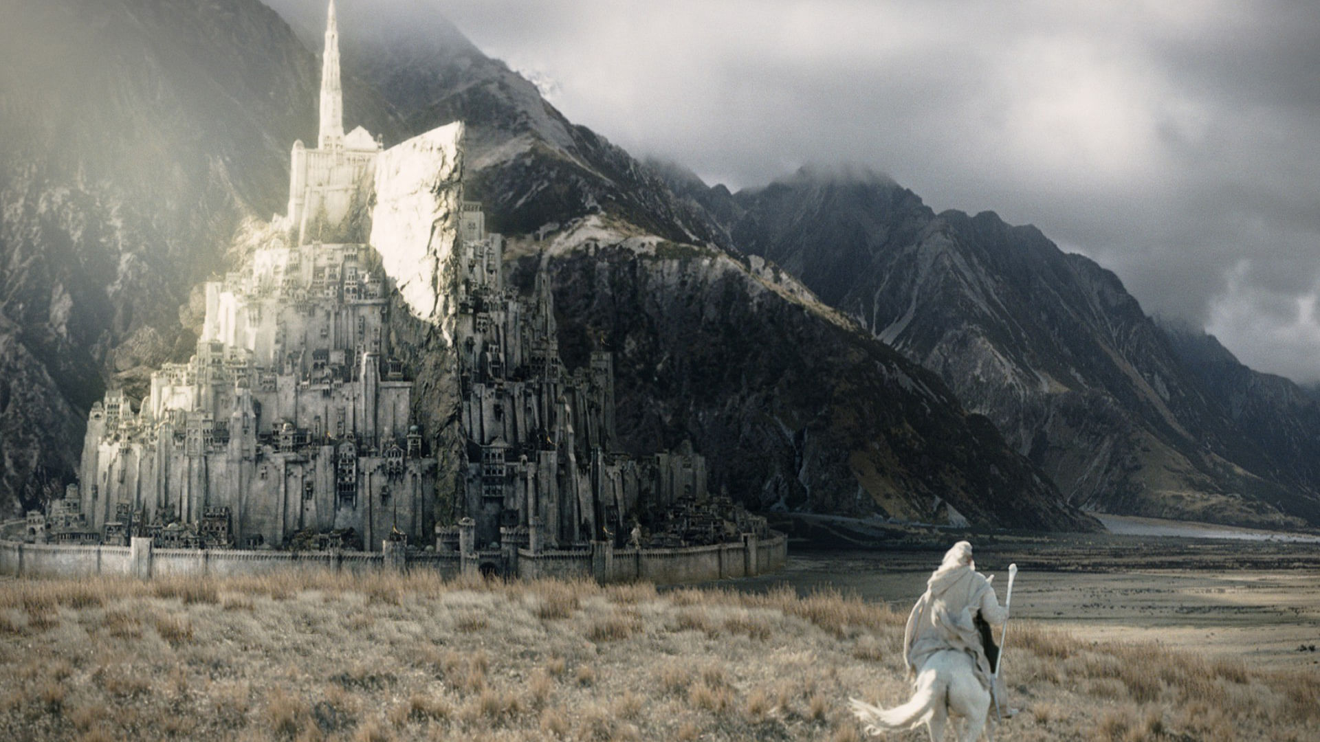 A screenshot of Gandalf galloping to Minas Tirith in <i>The Lord of the Rings</i>.