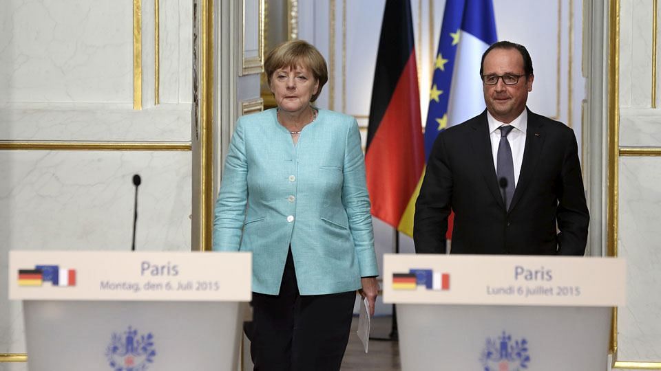 French President Francois Hollande and German Chancellor Angela Merkel  in Paris. (Photo: Reuters)