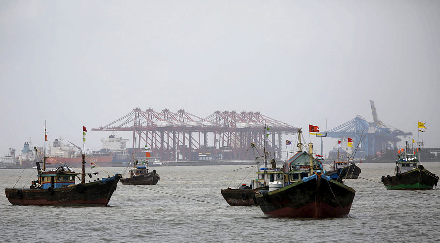 Ports expand but road, rail links lag. Global trade downturn puts Indian exporters under pressure.