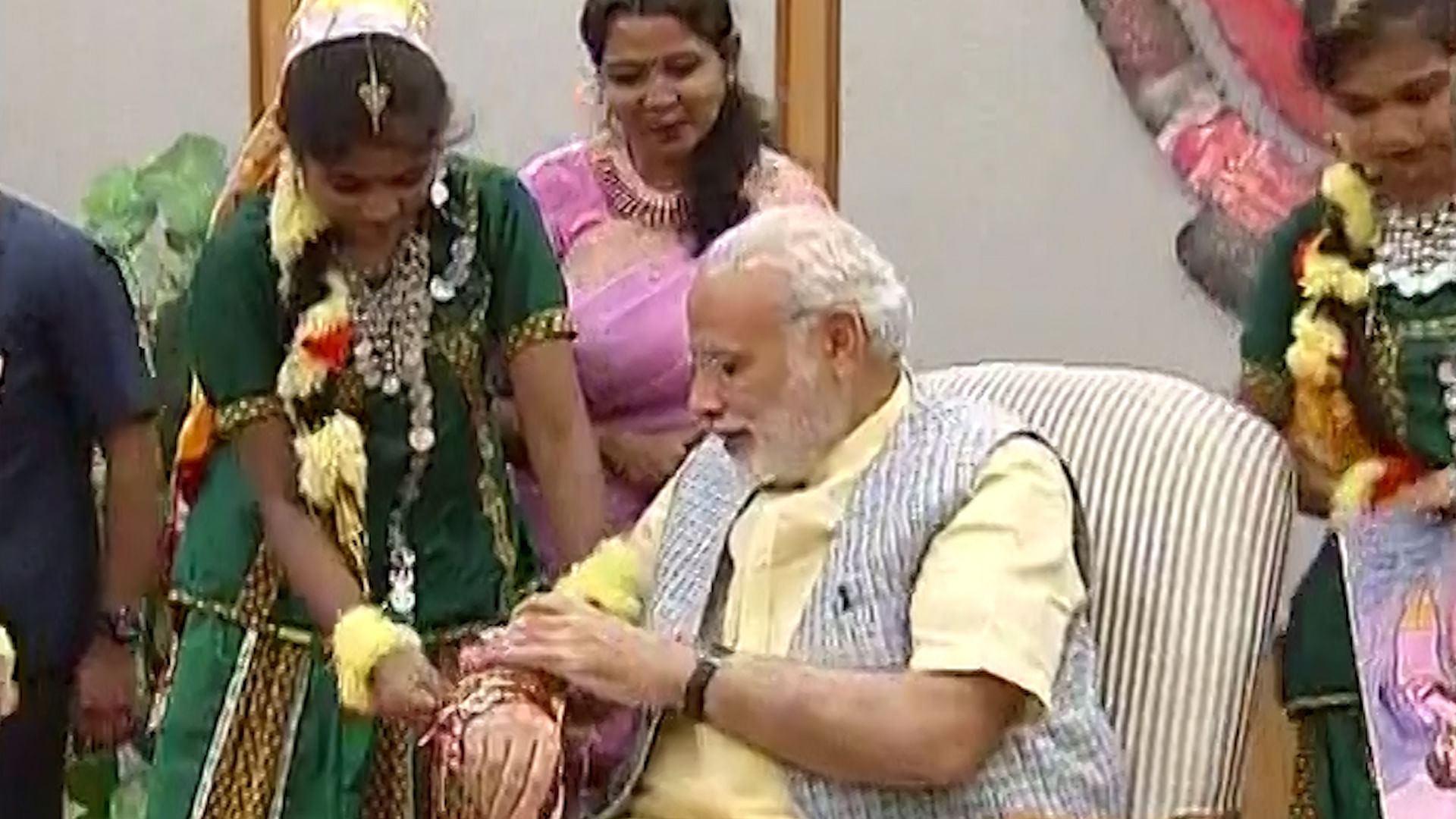 Prime Minister Narendra Modi celebrating Rakshabandhan at the PMO. (Photo: ANI screengrab)