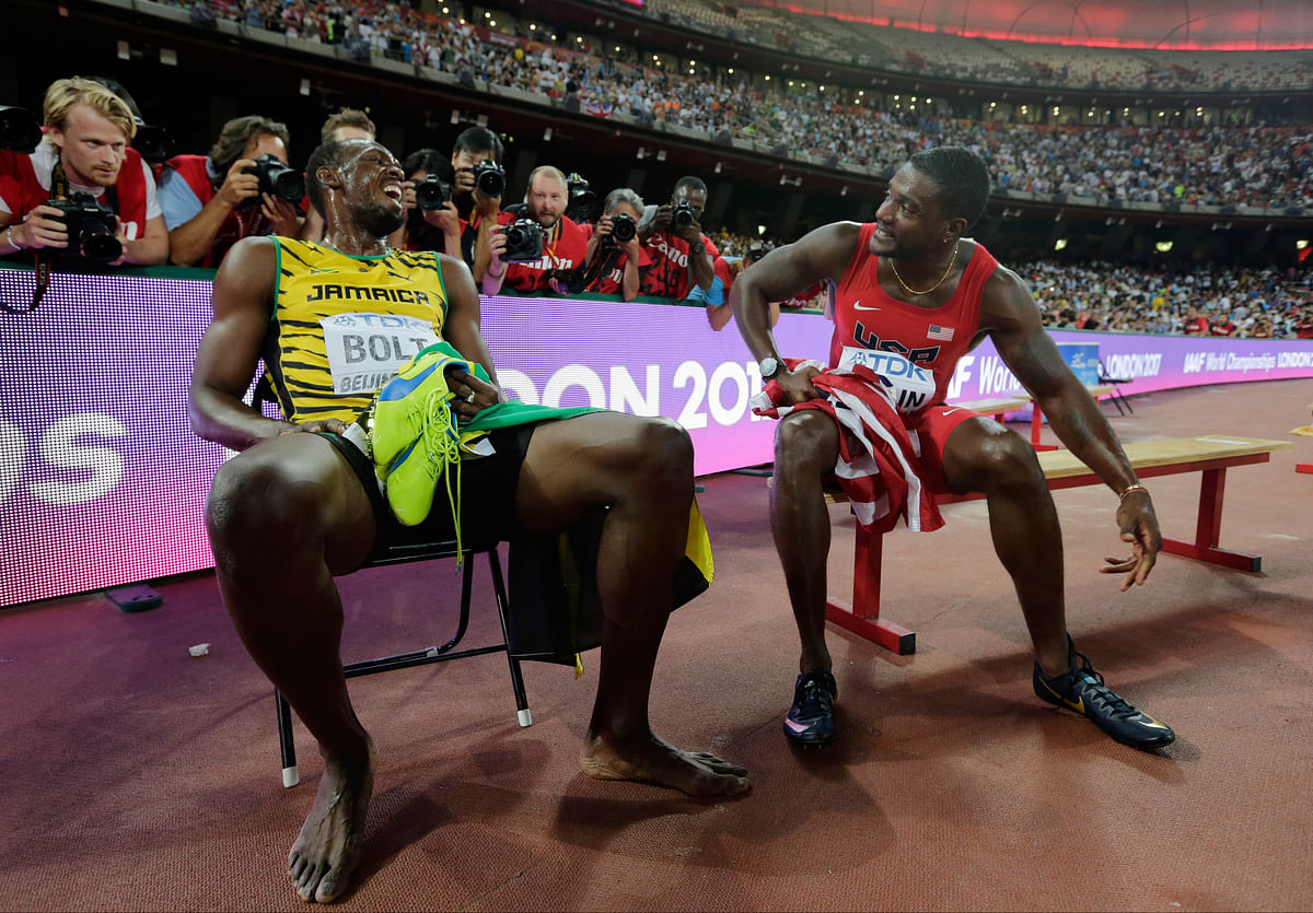 Soon after winning the 200m final, Bolt was hit by a cameraman who banged into him from behind.