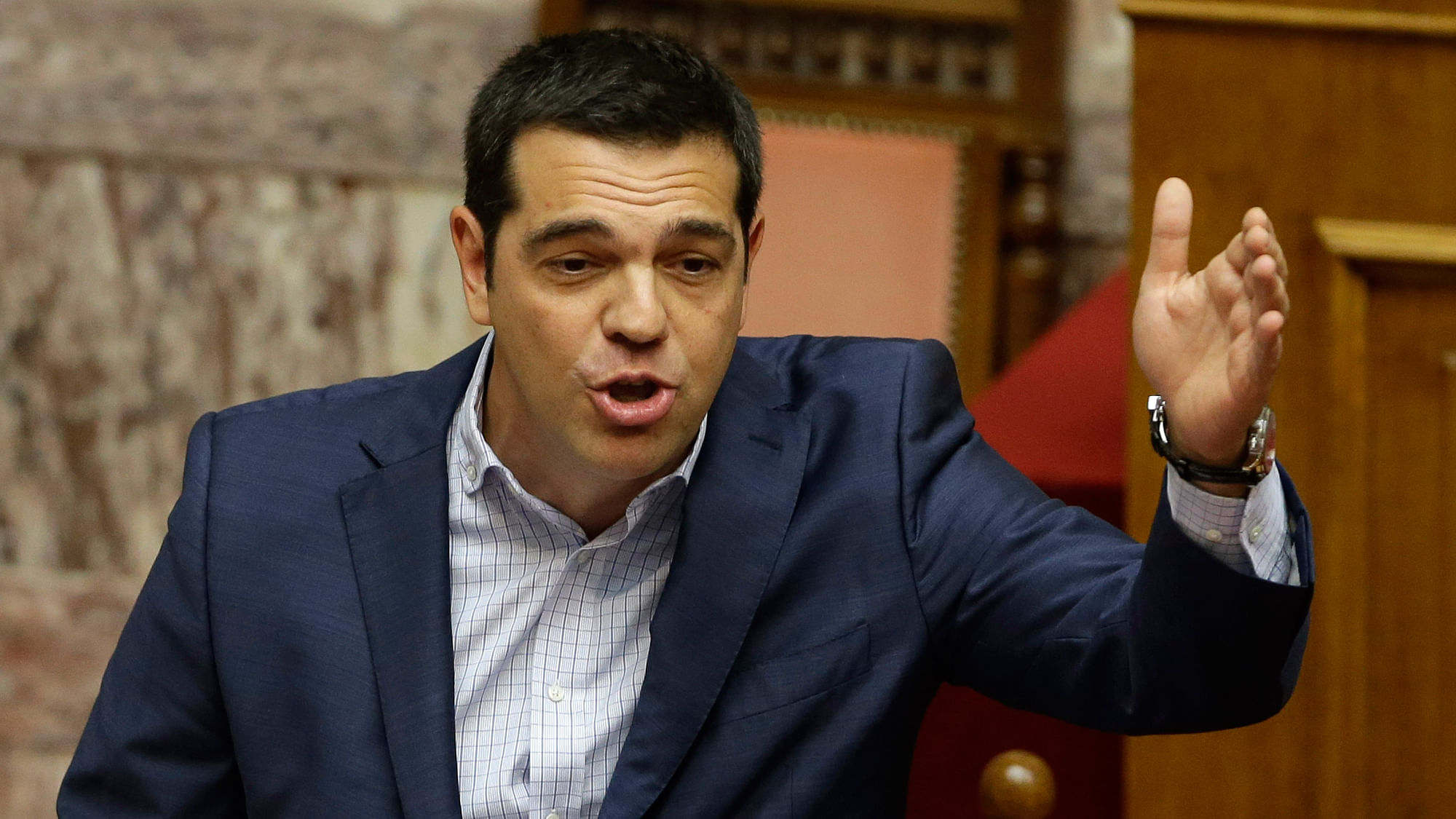 Greek Prime Minister Alexis Tsipras answers opposition questions in parliament in Athens, on Friday, July 31, 2015. (Photo: AP)