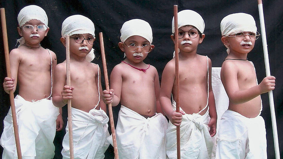 School children dressed as Mahatma Gandhi take part in a cultural programme organised to mark Mahatma Gandhi’s birth anniversary. (File Photo: Reuters)