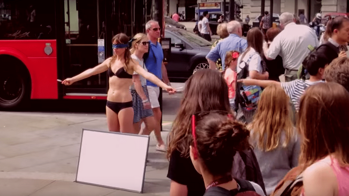 Woman strips in central London to send message about body acceptance