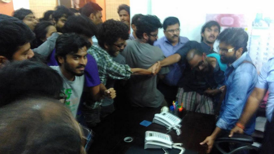 FTII students gheraoed Director Prashant Pathrabe in his office demanding a hold to be put on assessments being carried out. (Photo: <a href="https://twitter.com/taubaTOFsingh/status/633318634127908864">Twitter</a>)