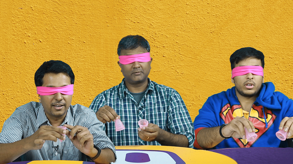 Men trying to figure out gadgets of the female cycle. Obviously they did not get anywhere close to the answer (Photo: The Quint)