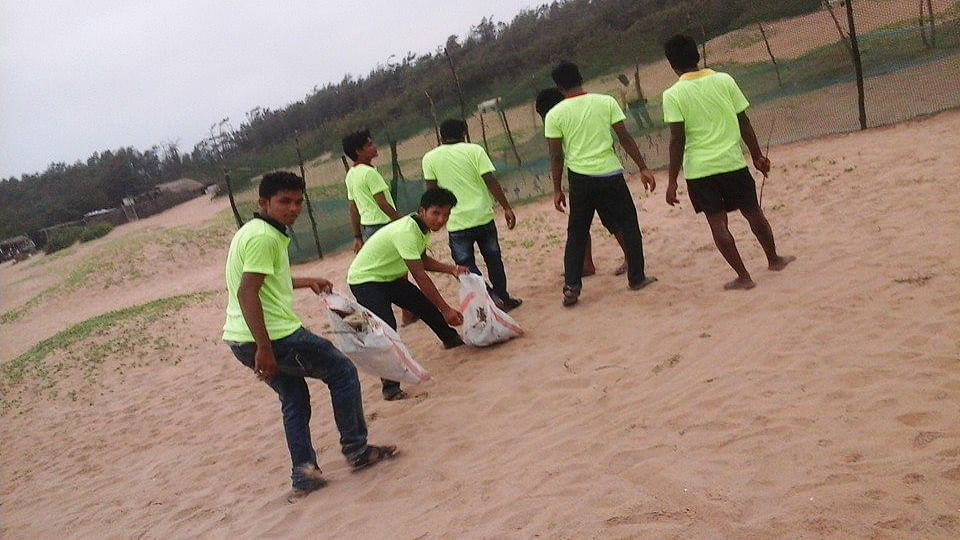 OPSA members cleaning the Olive Ridley nesting site at Astaranga beach (Photo: OPSA)