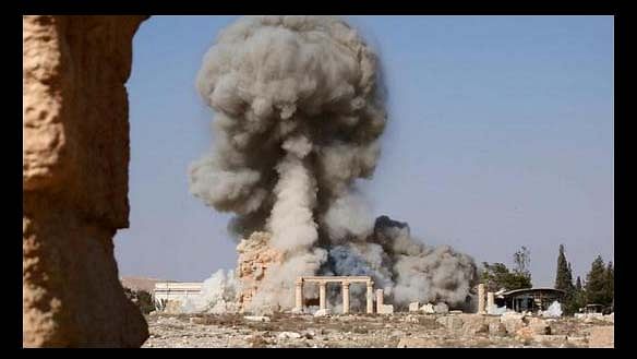ISIS militants blowing the Palmyra temple. (Photo: Islamic State social media account via AP)