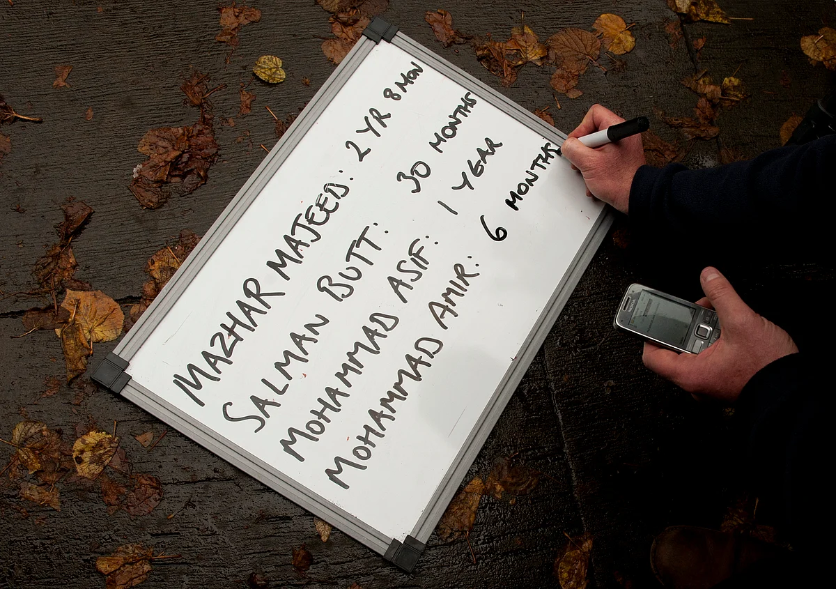 A white board filled by a BBC producer with the various length of prison sentences after sentencing was concluded for Pakistan cricketers Salman Butt, Mohammad Asif and Mohammad Amir and agent Mazhar Majeed in London. (Photo: Reuters)