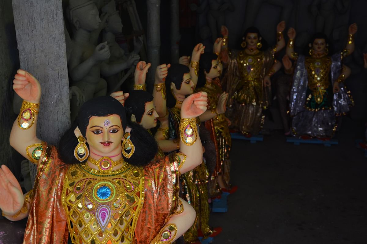 While Kumartuli kicks into overdrive, putting life into clay, Bengal gears up to welcome its beloved Durga Puja.